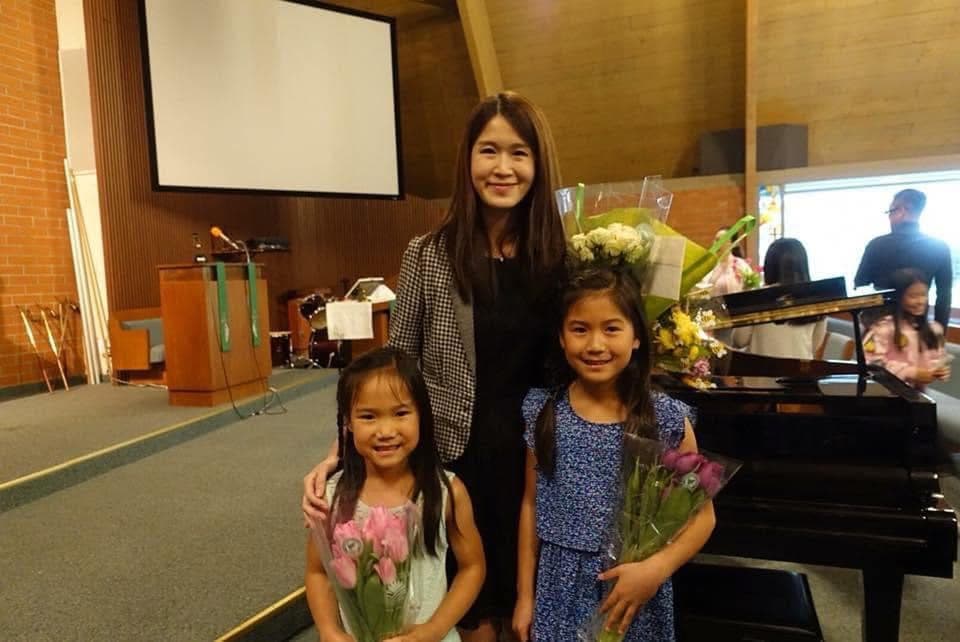 Eve with students after recital