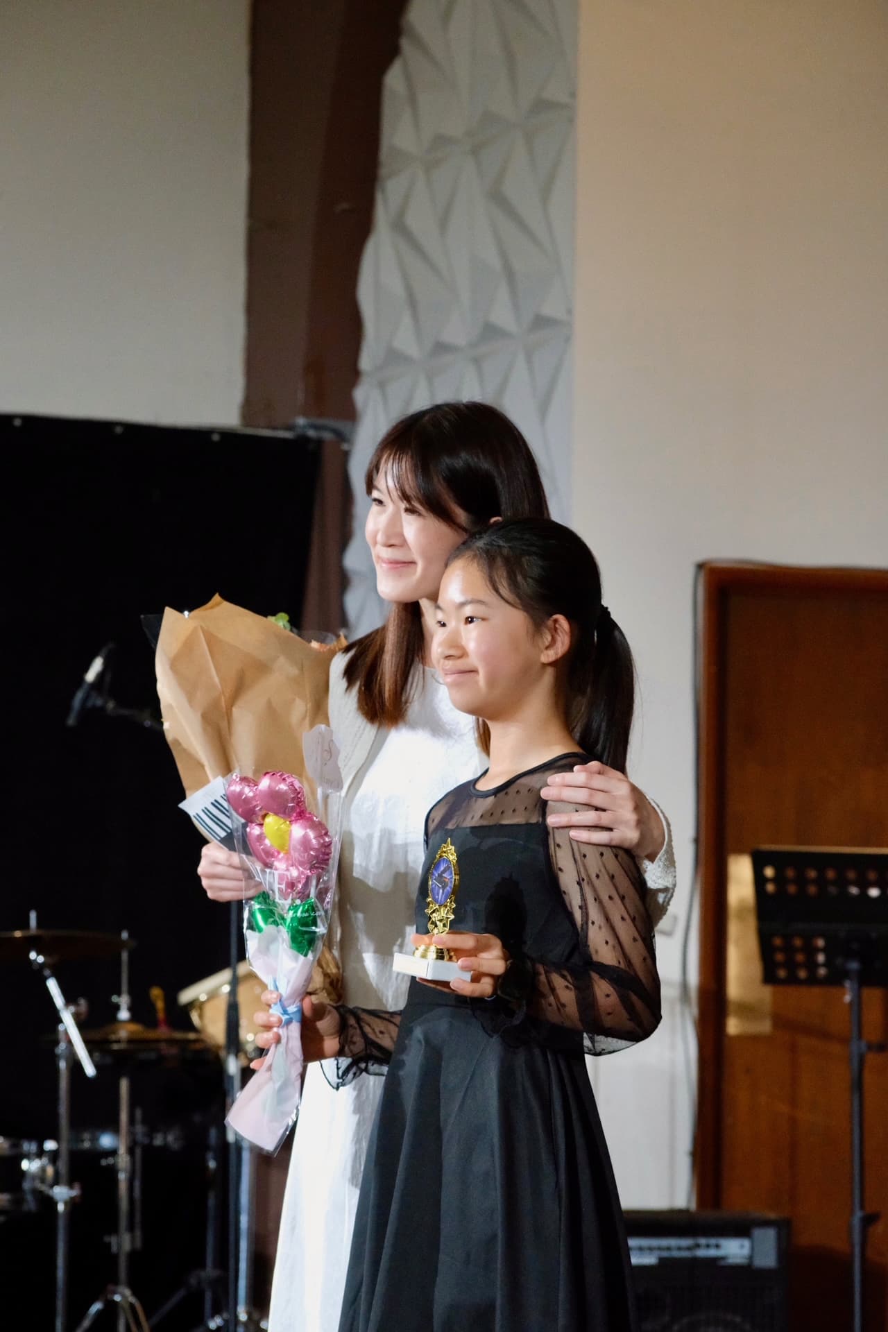 Eve with student — trophy winner